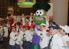 CPMA’s Freggies program promotes fruit and vegetable consumption for children. This group of schoolage children is walking the show with their mascot and learns about fresh produce.